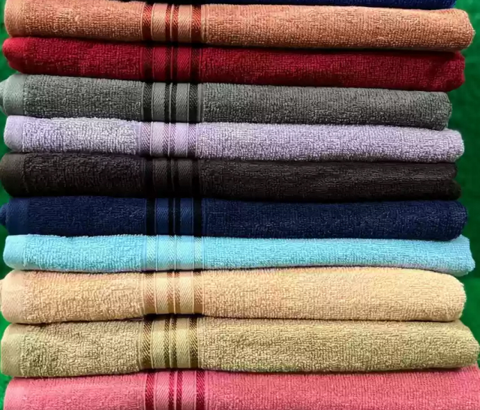 a stack of towels with stripes