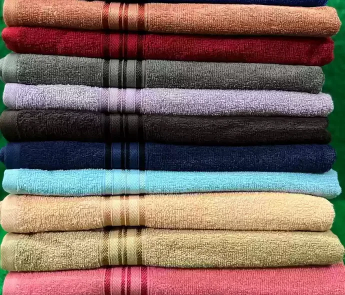 a stack of towels with stripes