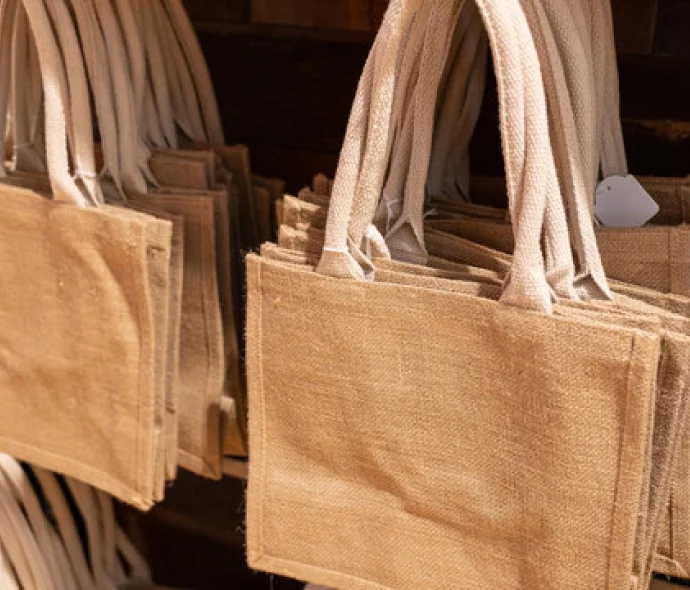 a group of tan bags on a wall